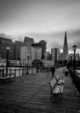 Vertical Park Benches Line the Edges of Pier 7 in San Francisco black and white Photos