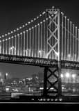 Vertical The LEDs along the Vertical Support Cables of the Bay Bridge black and white Photos