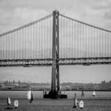 Square The San Francisco Bay Bridge and Sail Boats on the Bay black and white Photos