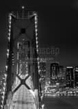 Vertical The SF Bay Bridge and San Francisco Hills at Night black and white Photos