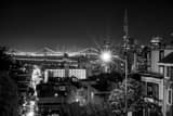 Horizontal A Street Lamp over San Francisco at 3am black and white Photos