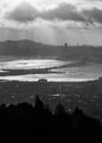 Vertical Sun Rays over the San Francisco Bay landscape black and white Photography