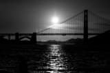Horizontal The Setting Sun Silhouettes the Golden Gate Bridge landscape black and white Photography