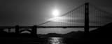 Panoramic The Setting Sun Silhouettes the Golden Gate Bridge landscape black and white Photography