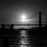 Square The Setting Sun Silhouettes the Golden Gate Bridge landscape black and white Photography