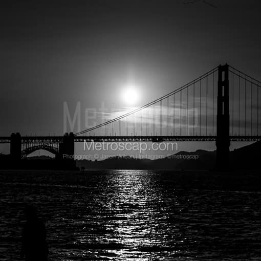 The Setting Sun Silhouettes the Golden Gate Bridge -- San Francisco Black and White Photos