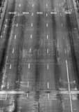 Vertical The Westbound Top Deck of I-80 on the Bay Bridge. black and white Photos