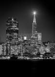 Vertical The Illuminated Beacon atop the Transamerica Pyramid black and white Photos