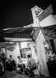 Vertical Vinnie Van Go Gos Pizzeria black and white Photography