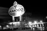 Horizontal The Giant Amoco Sign black and white Photos