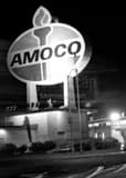Vertical The Giant Amoco Sign black and white Photos