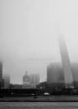 Vertical The Gateway Arch Fades into the Fog black and white Photos