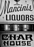 Vertical Mancinis Char House black and white Photography