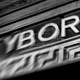Square A Blurry Ybor City Sign black and white Photos