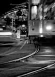Vertical A Taxi and Street Car Converge on Channelside black and white Photos