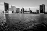 Horizontal The Toledo Skyline along a Choppy Maumee River Framed Photos