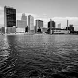 Square The Toledo Skyline along a Choppy Maumee River Framed Photos