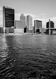 Vertical The Toledo Skyline along a Choppy Maumee River Framed Photos