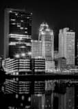 Vertical The Toledo Skyline at Night Reflecting into a Still Maumee River black and white Pictures