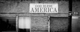 Panoramic A God Bless America Banner above a Dilapidated Building in Toledo black and white Pictures