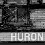 Square A Huron Street Sign Painted onto a Building in Downtown Toledo black and white Pictures