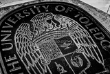 Horizontal Utoledo Seal black and white