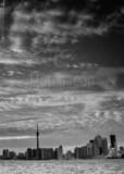 Vertical The Toronto Skyline Under Whispy Clouds black and white Photography
