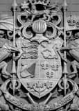 Vertical Canada's Coat of Arms on Canada Post Building black and white Photos