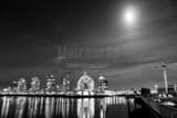 Horizontal The Moon Illuminates the TELUS Science World Dome at Night black and white Photos