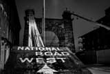 Horizontal Wheeling Suspension Bridge at Night Photography