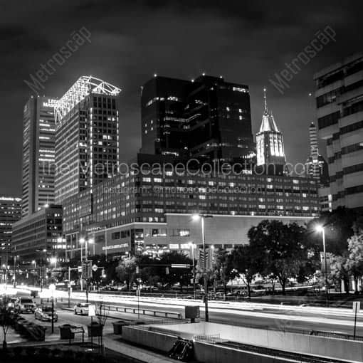 Traffic in the Foreground of the Baltimore Skyline Along Pratt Street -- Baltimore Black and White Wall Art
