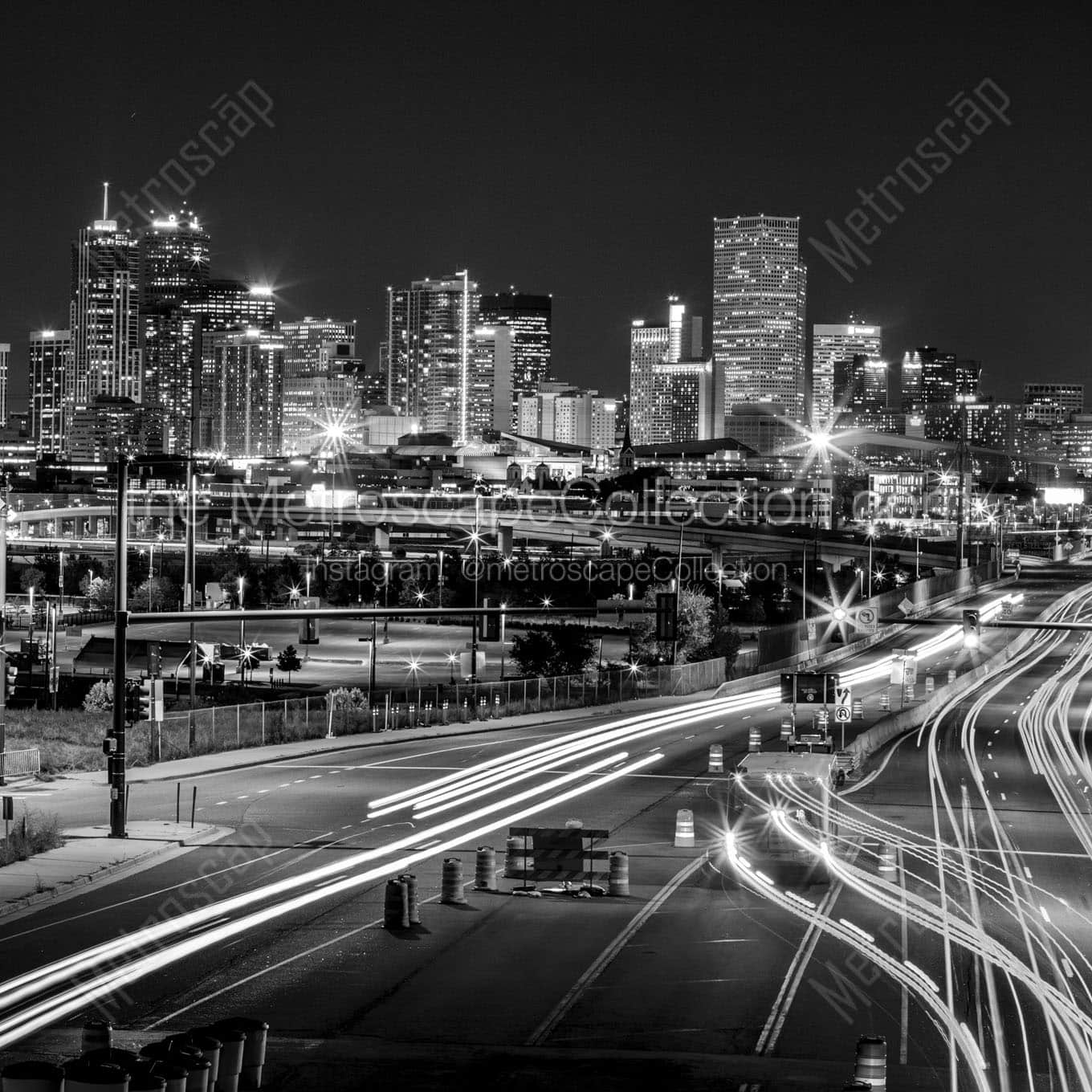 The Denver Skyline at Night above Colfax Avenue Wall Art square crop