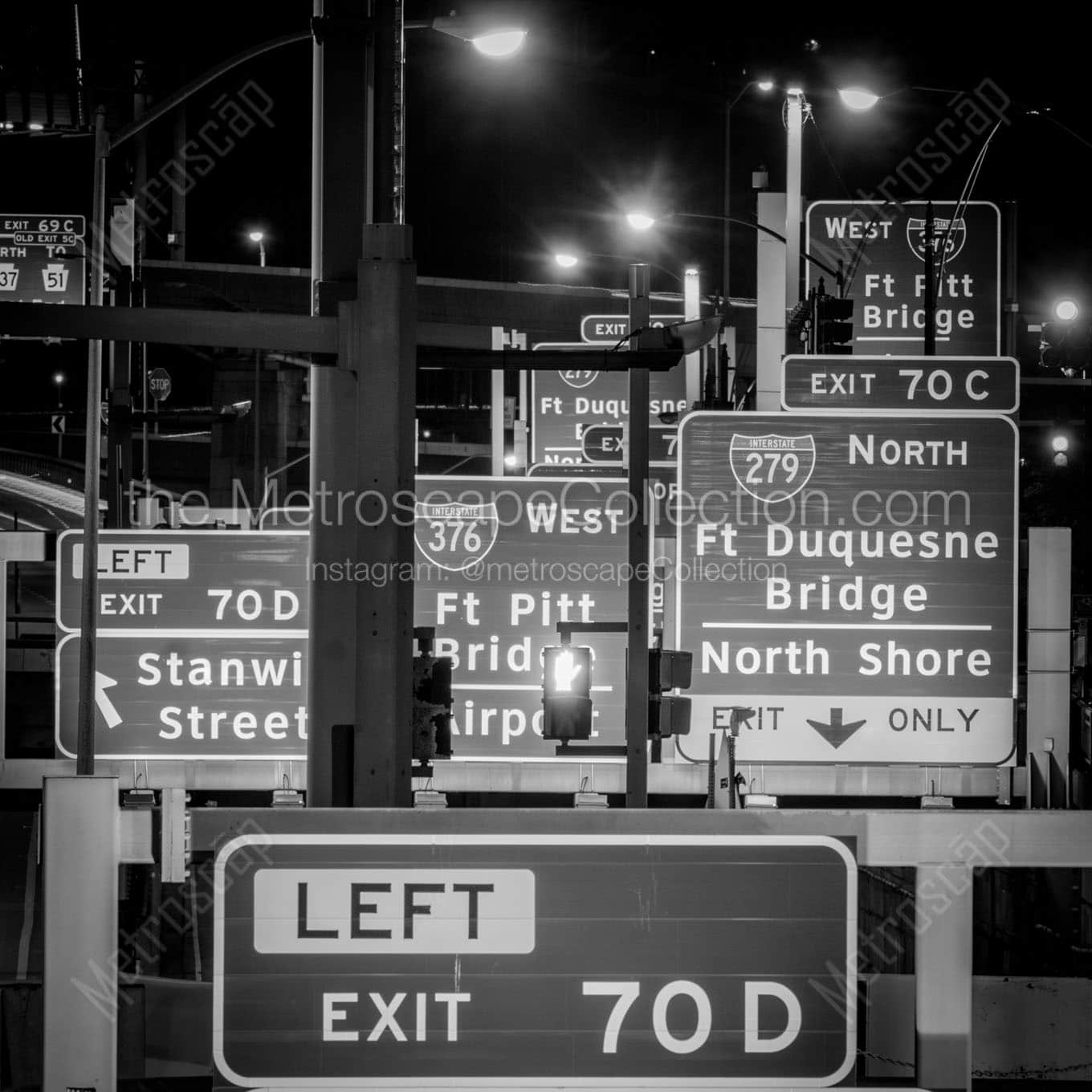 Traffic Signs on I-376 in Downtown Pittsburgh at Night Wall Art square crop