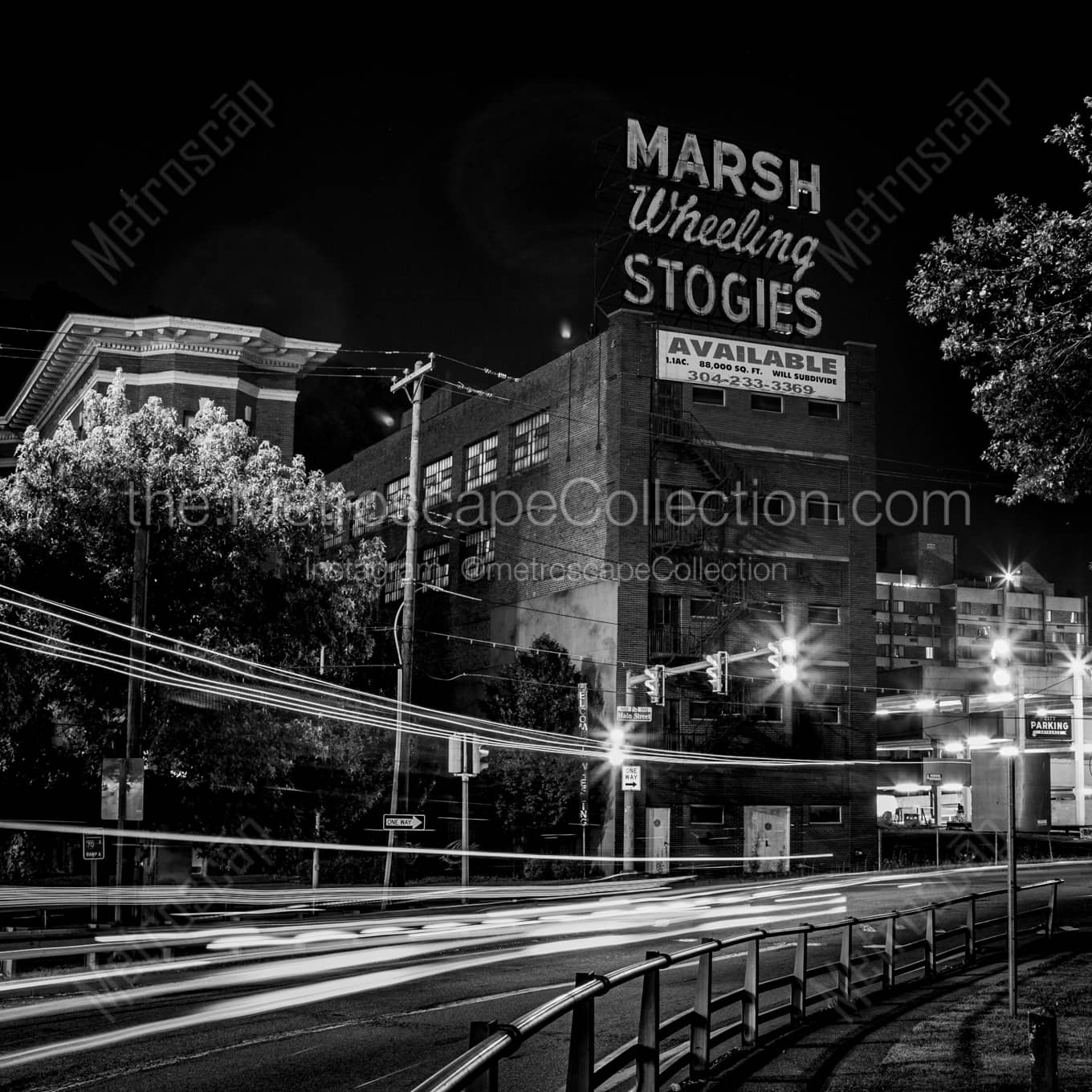 The Marsh Wheeling Stogies Building at Night Wall Art square crop