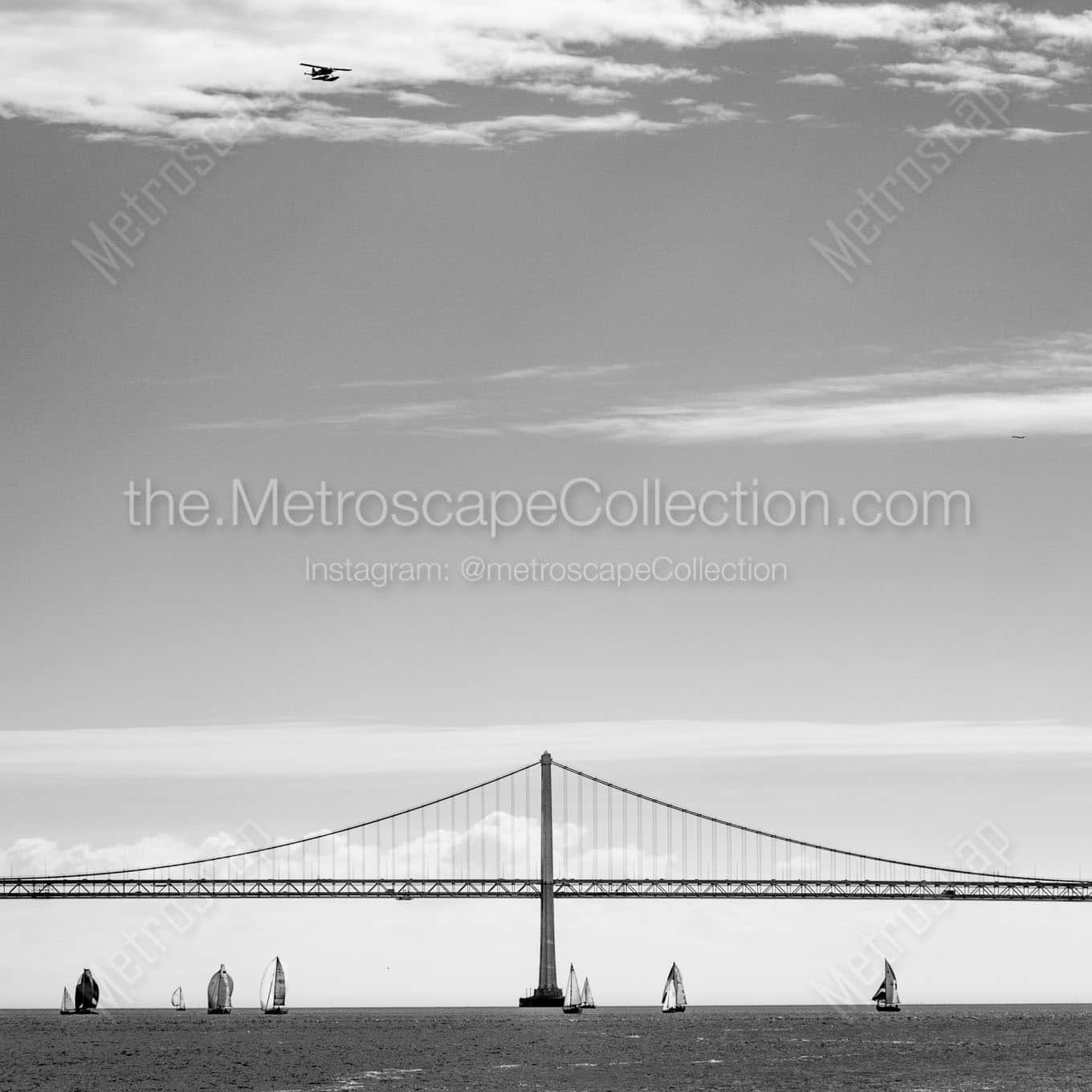 A Seaplane Flys above the San Francisco Bay Bridge Wall Art square crop