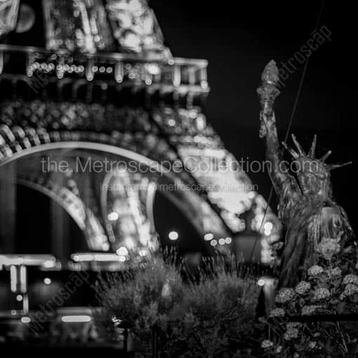 A Small Statue of Liberty on the Back of a Boat on the Seine -- Paris Black and White Wall Art